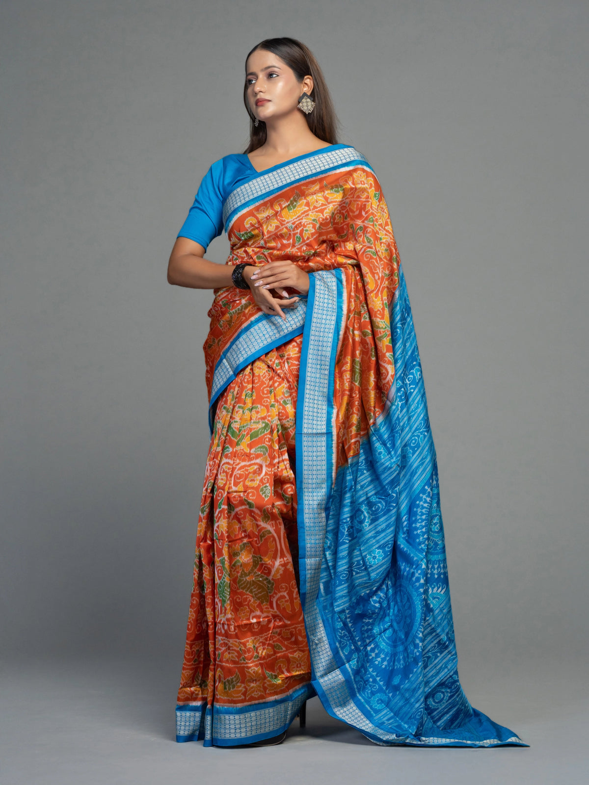 Orange & Blue Mulberry Silk Ikat Saree with Dancer Motifs - Border and weave close-up