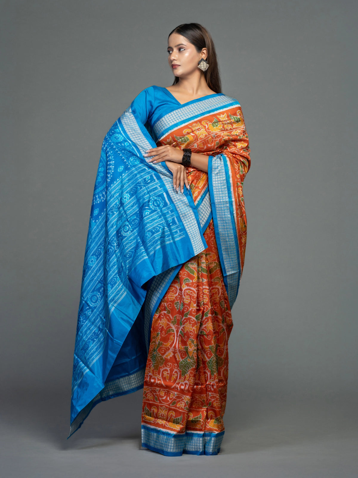 Orange & Blue Mulberry Silk Ikat Saree with Dancer Motifs - Body motifs and craftsmanship